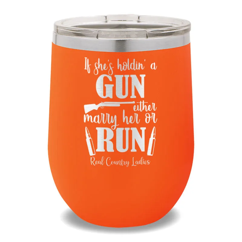 If She's Holdin' A Gun 12oz Stemless Wine Cup